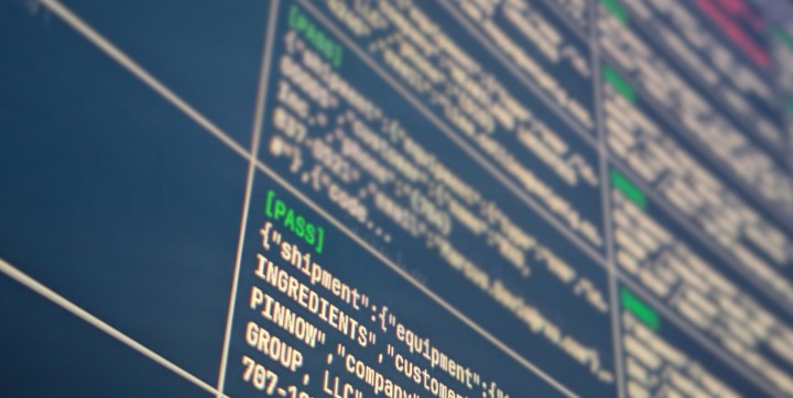 An picture of a screen showing a prompt foo evaluation run with most of the data in the background blurred.